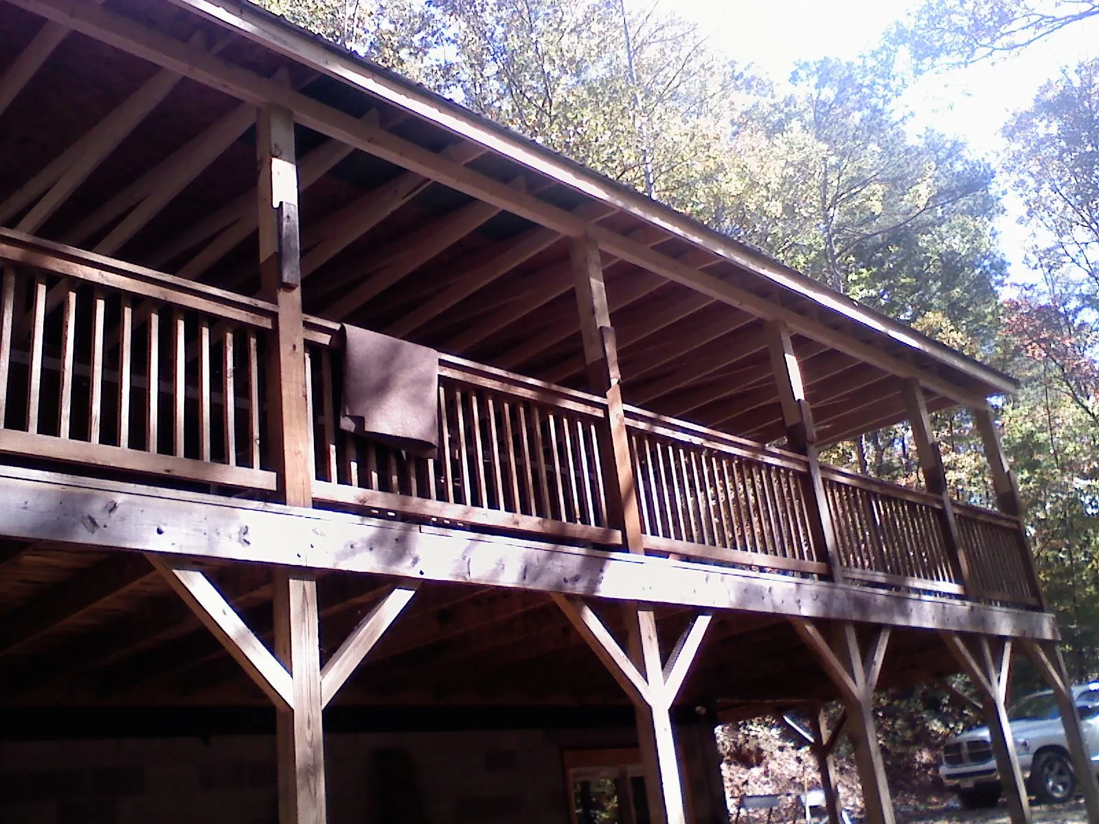 Timber framing under a new elevated porch and deck — Roof Leak Repair in Charlotte Hall by Roofing Brothers